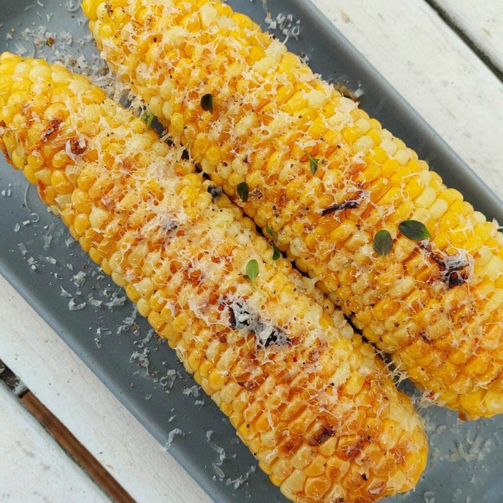 Oven Roasted Corn On The Cobb With Garlic Butter And Parmesan