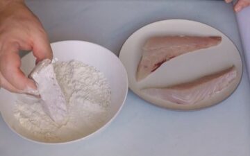 Coating The Kingfish In Seasoned Rice Flour